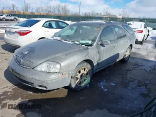 2004 Mercury Sable LS Premium z VIN 1MEFM59S64A608491, wystawiony jako IAAI lot #41599768 z przebiegiem 183 667 mil mil oraz . Historia ofert i sprzedaży dostępna na DreamBid. Obrazek 2.