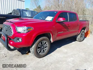 2023 Toyota Tacoma 4WD SR with VIN 3TYCZ5AN2PT165019, listed as a IAAI auction lot 41672156 with 32,813 mi miles. Bid and sale history available at carsss.com. Image 2.