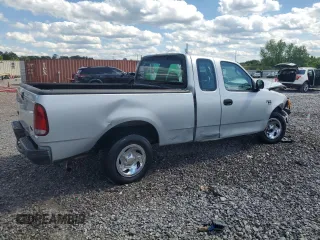 2004 Ford F-150 XL with VIN 2FTRX17W24CA52991, listed as a Copart auction lot 55853095 with 221,452 mi miles and Salvage title. Bid and sale history available at DreamBid. Image 3.