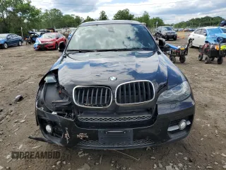 2012 BMW X6 50i z VIN 5UXFG8C51CLZ97393, wystawiony jako Copart lot #58407285 z przebiegiem 128 040 mil mil oraz Szkoda całkowita • Salvage title. Historia ofert i sprzedaży dostępna na DreamBid. Obrazek 5.