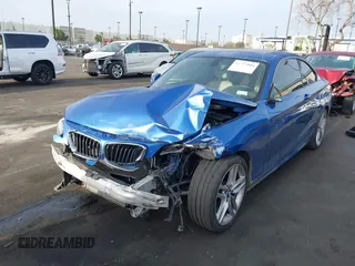 2015 BMW 2 Series 228i with VIN WBA1F5C59FVW98205, listed as a IAAI auction lot 41722804 with 91,879 mi miles. Bid and sale history available at carsss.com. Image 6.