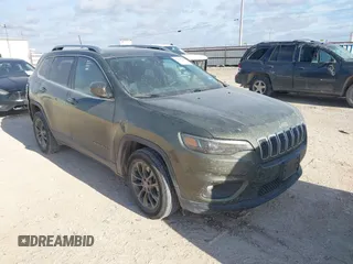 2021 Jeep Cherokee Latitude Lux with VIN 1C4PJLMX1MD221030, listed as a IAAI auction lot 41160799 with 121,011 mi miles. Bid and sale history available at carsss.com. Image 1.