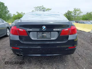 2014 BMW 5 Series 528i xDrive with VIN WBA5A7C54ED613352, listed as a IAAI auction lot 42197717 with 205,889 mi miles and . Bid and sale history available at carsss.com. Image 16.