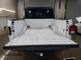 2023 Jeep Gladiator Sport с VIN 1C6HJTAG3PL571060, выставлен на аукционе Copart как лот 46112255 с пробегом 23 352 миль миль и Списание • Salvage title. История ставок и продаж доступна на DreamBid. Изображение 6.