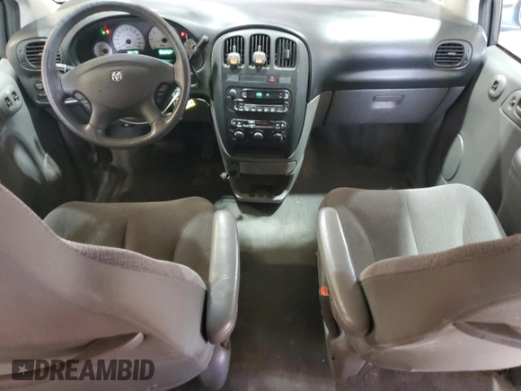 2005 Dodge Caravan SE z VIN 1D4GP24R45B245977, wystawiony jako Copart lot #58262555 z przebiegiem 254 176 mil mil oraz Czysty tytuł • Clean title. Historia ofert i sprzedaży dostępna na DreamBid. Obrazek 8.
