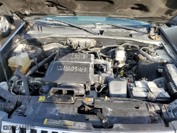 2009 Mercury Mariner with VIN 4M2CU91GX9KJ17811, listed as a Copart auction lot 83631944 with 135,837 mi miles and Salvage Title. Bid and sale history available at carsss.com. Image 12.