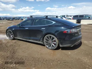 2014 Tesla Model S P85D with VIN 5YJSA1H28EFP63765, listed as a Copart auction lot 50241385 with 100,274 mi miles and Salvage Title. Bid and sale history available at DreamBid. Image 2.