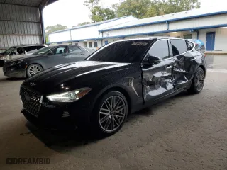 2020 Genesis G70 2.0T with VIN KMTG34LA4LU064770, listed as a Copart auction lot 77801363 with 79,998 mi miles. Bid and sale history available at carsss.com. Image 1.