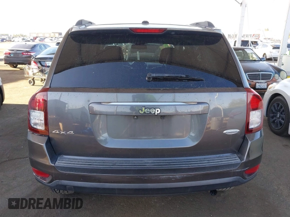 2016 Jeep Compass Latitude with VIN 1C4NJDEB2GD685383, listed as a IAAI auction lot 41968450 with 273,938 mi miles. Bid and sale history available at carsss.com. Image 16.