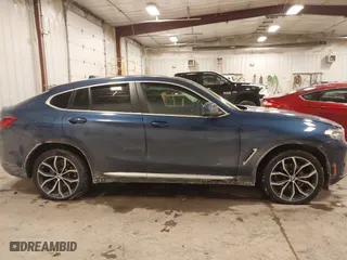 2023 BMW X4 xDrive30i with VIN 5UX33DT01P9R31277, listed as a IAAI auction lot 41618617 with 23,952 mi miles. Bid and sale history available at carsss.com. Image 13.