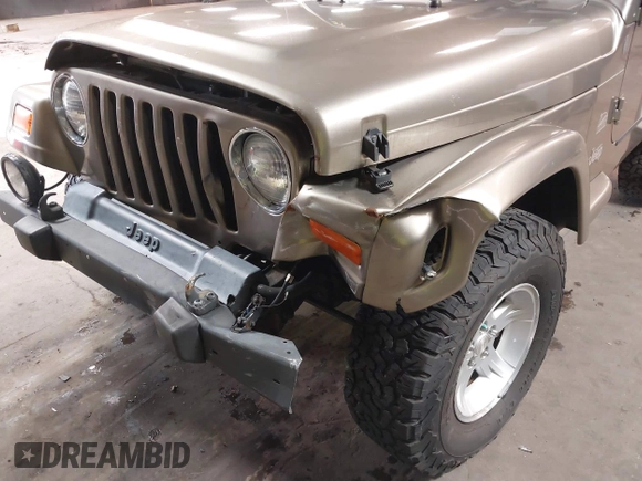 2004 Jeep Wrangler Sahara with VIN 1J4FA59S64P736389, listed as a IAAI auction lot 41432819 with 102,830 mi miles and . Bid and sale history available at DreamBid. Image 6.