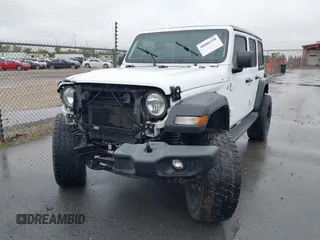 2019 Jeep Wrangler Unlimited Sport Altitude with VIN 1C4HJXDG3KW528647, listed as a IAAI auction lot 40986538 with 85,381 mi miles and . Bid and sale history available at DreamBid. Image 13.