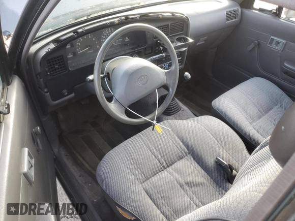 1994 Toyota Pickup z VIN 4TARN93P9RZ255143, wystawiony jako Copart lot #49554475 z przebiegiem 249 957 mil mil oraz Szkoda całkowita • Salvage title. Historia ofert i sprzedaży dostępna na DreamBid. Obrazek 8.