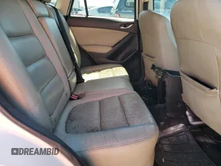 2014 Mazda CX-5 Grand Touring with VIN JM3KE4DY6E0363211, listed as a Copart auction lot 48352315 with 214,298 mi miles and Salvage Title. Bid and sale history available at DreamBid. Image 11.