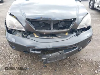 2008 Lexus RX 400h with VIN JTJGW31U382850234, listed as a IAAI auction lot 41556774 with 124,697 mi miles and . Bid and sale history available at DreamBid. Image 6.
