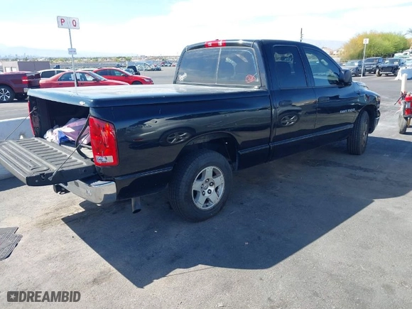 2005 Dodge Ram 1500 SLT with VIN 1D7HA18D55S238831, listed as a IAAI auction lot 42022660 with 207,523 mi miles. Bid and sale history available at carsss.com. Image 4.
