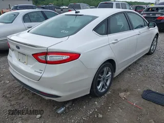 2016 Ford Fusion SE Hybrid with VIN 3FA6P0LU7GR356479, listed as a IAAI auction lot 42252046 with 119,046 mi miles and . Bid and sale history available at DreamBid. Image 4.