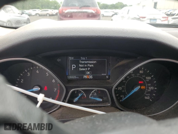 2017 Ford Focus Titanium z VIN 1FADP3N29HL240527, wystawiony jako Copart lot #62891695 z przebiegiem 126 926 mil mil oraz Szkoda całkowita • Salvage title. Historia ofert i sprzedaży dostępna na DreamBid. Obrazek 9.