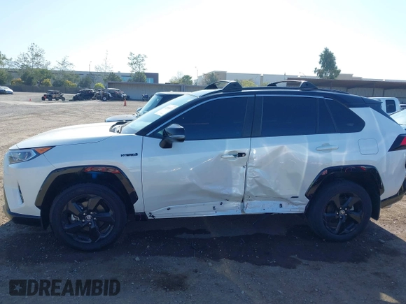 2021 Toyota RAV4 Hybrid XSE with VIN 4T3E6RFV3MU042773, listed as a IAAI auction lot 42000073 with 55,110 mi miles and . Bid and sale history available at DreamBid. Image 15.