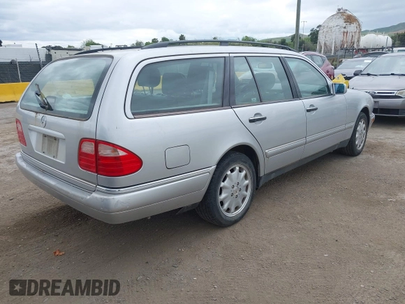 1999 Mercedes-Benz E-Class with VIN WDBJH65F5XA721205, listed as a IAAI auction lot 42068204 with 183,421 mi miles. Bid and sale history available at carsss.com. Image 4.