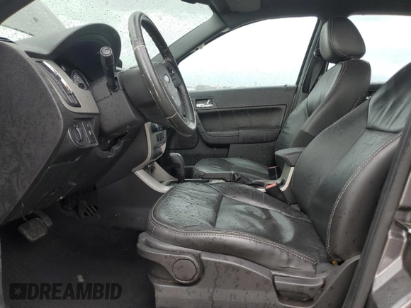 2010 Ford Focus SES with VIN 1FAHP3GN3AW209027, listed as a Copart auction lot 50987785 with 183,491 mi miles and Salvage Title. Bid and sale history available at carsss.com. Image 7.