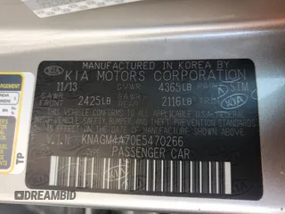 2014 Kia Optima LX with VIN KNAGM4A70E5470266, listed as a Copart auction lot 65084275 with 144,497 mi miles and Clean title. Bid and sale history available at DreamBid. Image 12.