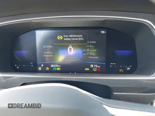 2023 Volkswagen Tiguan SE z VIN 3VVNB7AX5PM064693, wystawiony jako IAAI lot #42033011 z przebiegiem 38 220 mil mil oraz . Historia ofert i sprzedaży dostępna na DreamBid. Obrazek 7.