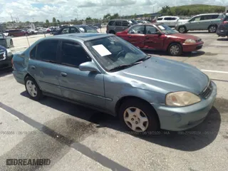 1999 Honda Civic EX with VIN 1HGEJ8643XL021026, listed as a IAAI auction lot 41686947 with 181,103 mi miles. Bid and sale history available at carsss.com. Image 1.