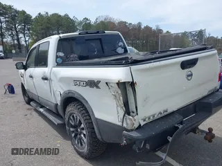 2017 Nissan Titan SV with VIN 1N6AA1E50HN540827, listed as a IAAI auction lot 42105294 with 139,914 mi miles and . Bid and sale history available at DreamBid. Image 3.