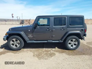 2017 Jeep Wrangler Unlimited Sahara with VIN 1C4BJWEG7HL641347, listed as a IAAI auction lot 41833356 with 84,735 mi miles. Bid and sale history available at carsss.com. Image 15.