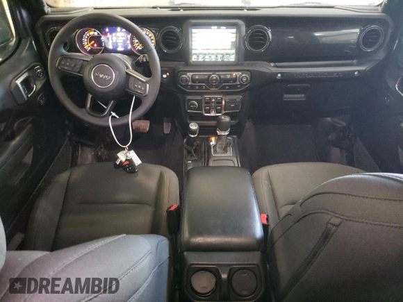 2023 Jeep Wrangler Sport Altitude with VIN 1C4HJXDG0PW679789, listed as a Copart auction lot 65991094 with 13,503 mi miles and Salvage Title. Bid and sale history available at DreamBid. Image 8.