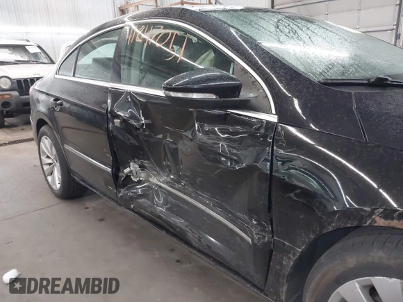 2012 Volkswagen CC Sport PZEV with VIN WVWMP7AN8CE537805, listed as a IAAI auction lot 41847051 with 147,095 mi miles. Bid and sale history available at carsss.com. Image 6.