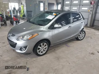 2012 Mazda 2 Touring with VIN JM1DE1LY8C0140439, listed as a IAAI auction lot 41866835 with 122,512 mi miles. Bid and sale history available at carsss.com. Image 17.