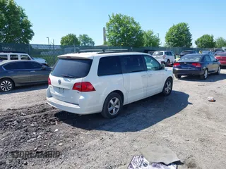2011 Volkswagen Routan SE z VIN 2V4RW3DG3BR717540, wystawiony jako IAAI lot #42198036 z przebiegiem 134 197 mil mil oraz . Historia ofert i sprzedaży dostępna na DreamBid. Obrazek 4.