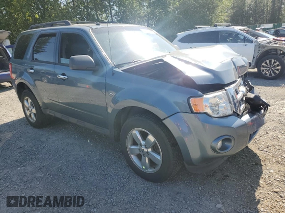 2012 Ford Escape XLT z VIN 1FMCU9DG1CKC54737, wystawiony jako Copart lot #59902055 z przebiegiem 206 067 mil mil oraz Szkoda całkowita • Salvage title. Historia ofert i sprzedaży dostępna na DreamBid. Obrazek 4.