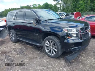 2017 Chevrolet Tahoe LT with VIN 1GNSKBKC9HR240233, listed as a IAAI auction lot 42244343 with 112,117 mi miles and . Bid and sale history available at DreamBid. Image 1.