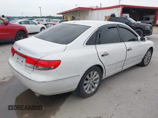 2009 Hyundai Azera Limited z VIN KMHFC46F39A358569, wystawiony jako IAAI lot #42294790 z przebiegiem 118 366 mil mil oraz . Historia ofert i sprzedaży dostępna na DreamBid. Obrazek 4.