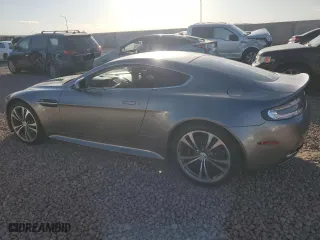 2011 Aston Martin V12 Vantage Carbon Black with VIN SCFEBBCF4BGS00791, listed as a Copart auction lot 76911374 with 8,207 mi miles and Salvage Title. Bid and sale history available at carsss.com. Image 2.