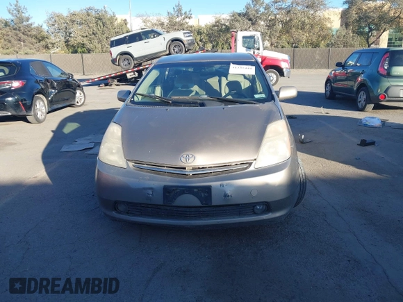 2005 Toyota Prius with VIN JTDKB20U453040279, listed as a IAAI auction lot 41335444 with 204,689 mi miles and . Bid and sale history available at DreamBid. Image 12.