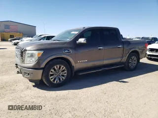 2017 Nissan Titan SL with VIN 1N6AA1E67HN519675, listed as a Copart auction lot 47175025 with 74,274 mi miles and Salvage title. Bid and sale history available at DreamBid. Image 1.