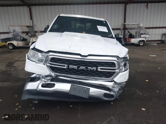 2023 Ram 1500 Big Horn z VIN 1C6RRFFG7PN698664, wystawiony jako IAAI lot #41103495 z przebiegiem 34 307 mil mil oraz . Historia ofert i sprzedaży dostępna na DreamBid. Obrazek 13.