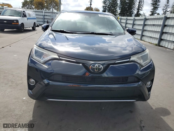 2018 Toyota RAV4 XLE with VIN 2T3WFREV6JW461945, listed as a Copart auction lot 51481275 with 60,173 mi miles and Salvage Title. Bid and sale history available at carsss.com. Image 5.