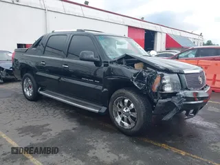 2002 Cadillac Escalade EXT z VIN 3GYEK63N82G257216, wystawiony jako IAAI lot #41708094 z przebiegiem Nie podano mil oraz . Historia ofert i sprzedaży dostępna na DreamBid. Obrazek 1.