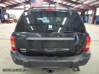 2003 Jeep Grand Cherokee Laredo with VIN 1J4GW48S23C613471, listed as a Copart auction lot 49521865 with 189,918 mi miles and Salvage Title. Bid and sale history available at carsss.com. Image 6.