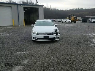 2018 Volkswagen Passat SEL Premium z VIN 1VWCA7A33JC017304, wystawiony jako Copart lot #86557824 z przebiegiem 74 001 mil mil oraz Szkoda całkowita • Salvage title. Historia ofert i sprzedaży dostępna na DreamBid. Obrazek 13.