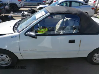 1992 Geo Metro z VIN JG1MR3364NK213871, wystawiony jako IAAI lot #41719350 z przebiegiem 22 589 mil mil oraz . Historia ofert i sprzedaży dostępna na DreamBid. Obrazek 14.