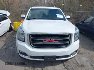 2016 GMC Yukon XL SLE with VIN 1GKS1FKC0GR331459, listed as a IAAI auction lot 41557718 with 203,803 mi miles. Bid and sale history available at carsss.com. Image 12.