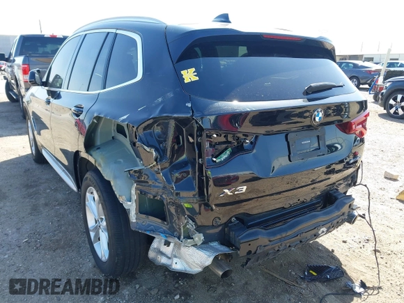 2021 BMW X3 sDrive30i with VIN 5UXTY3C09M9F84579, listed as a IAAI auction lot 41853738 with 56,809 mi miles and . Bid and sale history available at DreamBid. Image 6.