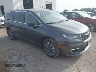 2023 Chrysler Pacifica Hybrid Touring L z VIN 2C4RC1L73PR598923, wystawiony jako IAAI lot #42124867 z przebiegiem 51 173 mil mil oraz . Historia ofert i sprzedaży dostępna na DreamBid. Obrazek 1.