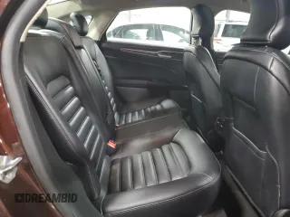 2019 Ford Fusion Hybrid SEL with VIN 3FA6P0MU5KR149757, listed as a Copart auction lot 67573034 with 64,695 mi miles and Salvage Title. Bid and sale history available at carsss.com. Image 10.